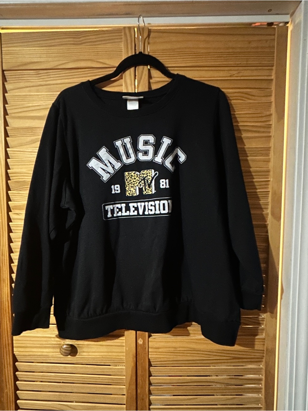 MTV Black Crewneck Sweater with Leopard Logo and White Lettering